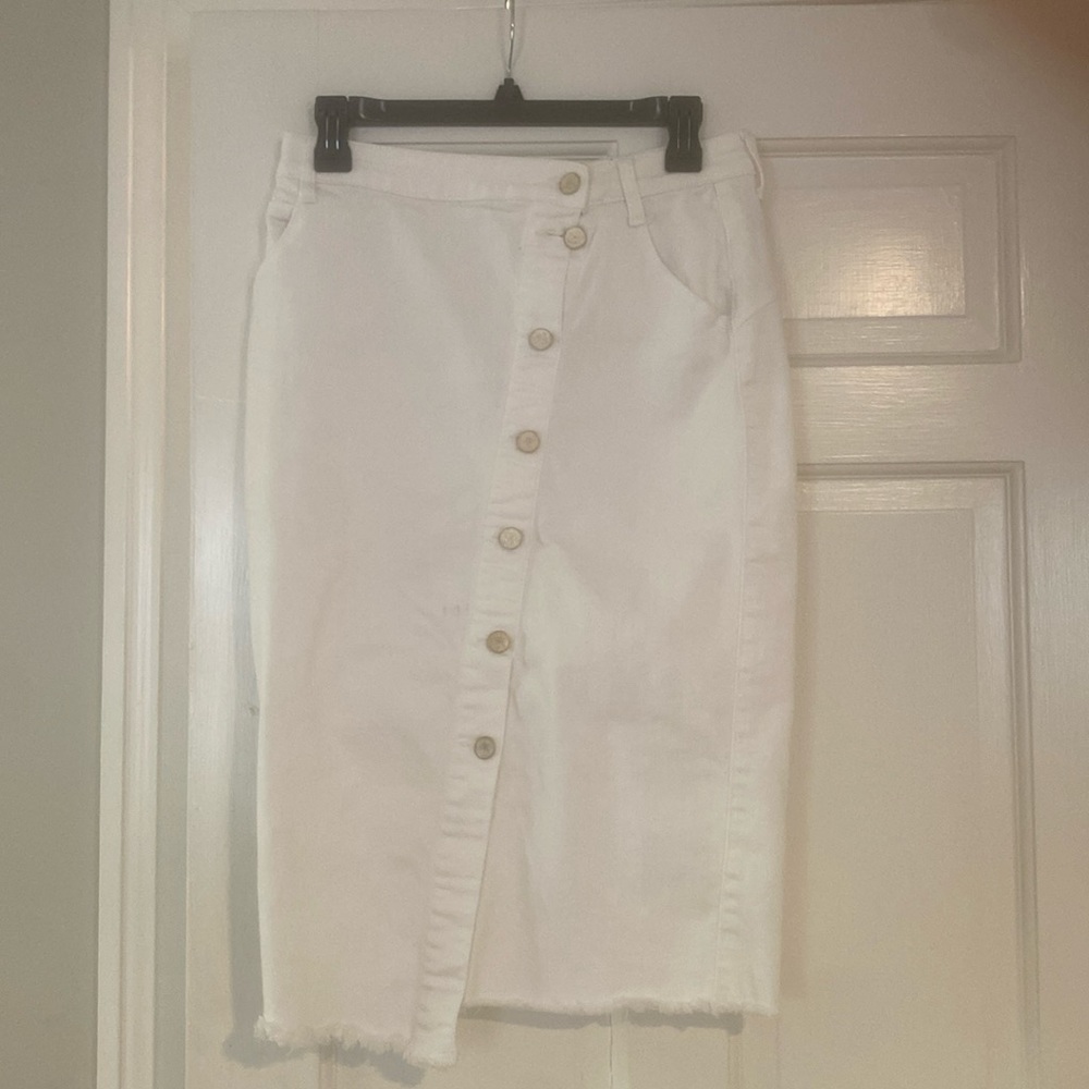 Wash lab white denim skirt. Asymmetrical. Buttons up front. Size 28